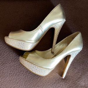 Gold bedazzled size 6 heels by Mariah Carey